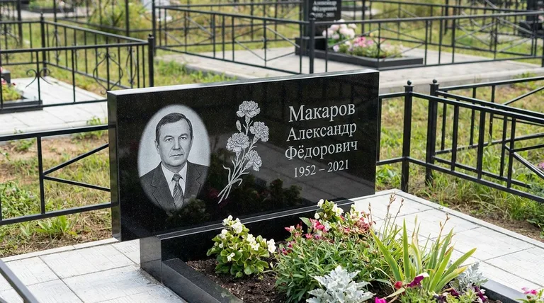 Памятник с гравировкой гвоздик — выполненная работа «Макаров» в Оренбурге