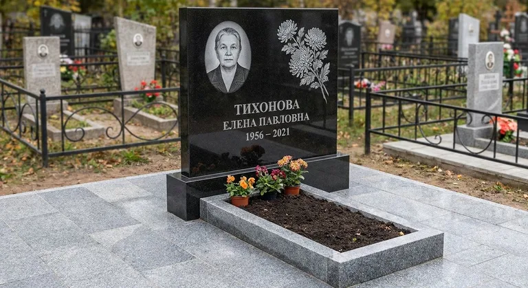 Памятник с гравировкой хризантем — выполненная работа «Тихонова» в Оренбурге