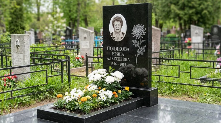 Памятник с гравировкой хризантем — выполненная работа «Полякова» в Оренбурге