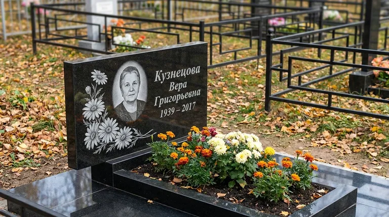 Памятник с гравировкой ромашек — выполненная работа «Кузнецова» в Оренбурге