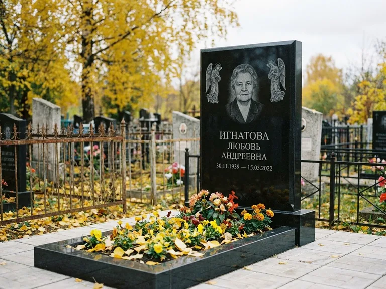 Памятник с гравировкой ангела — гравировка двух ангелов по сторонам портрета, работа «Игнатова» в Оренбурге